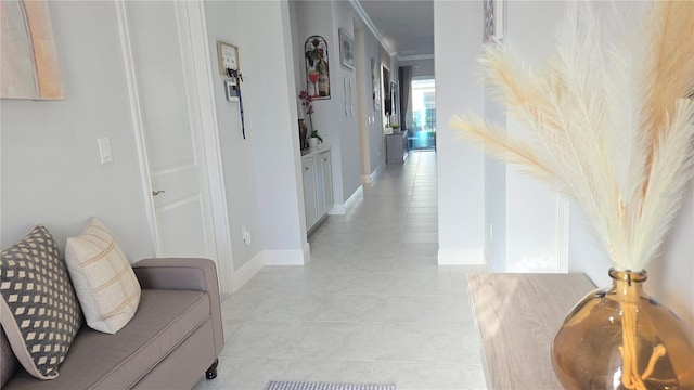 2853 Willowseed Ln, Saint Cloud, FL 34772 - hall featuring light tile patterned floors and crown molding