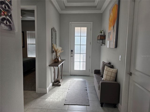 2853 Willowseed Ln, Saint Cloud, FL 34772 - entryway featuring ornamental molding and light tile patterned flooring