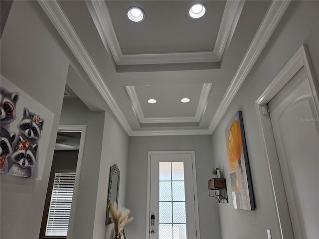 2853 Willowseed Ln, Saint Cloud, FL 34772 - entryway with a tray ceiling, ornamental molding, and recessed lighting