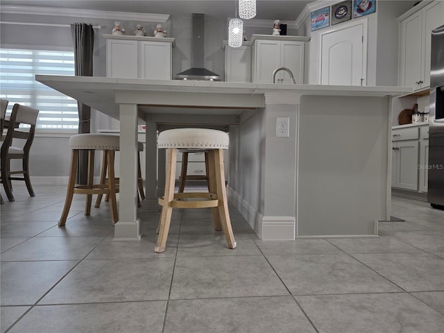 2853 Willowseed Ln, Saint Cloud, FL 34772 - dining area with crown molding and light tile patterned floors