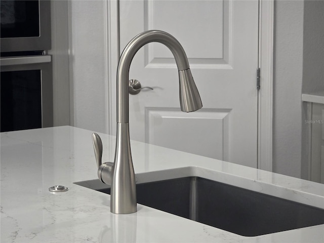 2853 Willowseed Ln, Saint Cloud, FL 34772 - detailed view of a sink and double oven