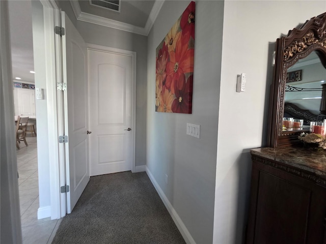 2853 Willowseed Ln, Saint Cloud, FL 34772 - hallway featuring ornamental molding and light tile patterned floors