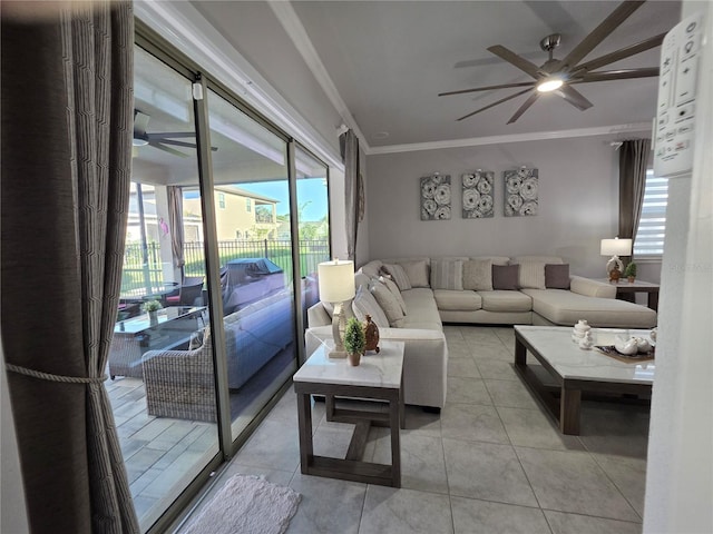 2853 Willowseed Ln, Saint Cloud, FL 34772 - living room with ceiling fan, crown molding, and light tile patterned floors