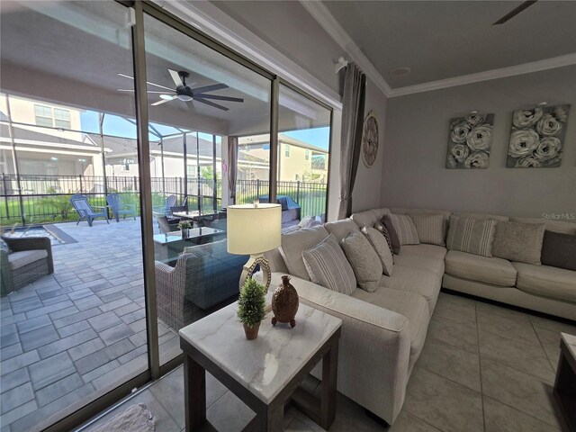 2853 Willowseed Ln, Saint Cloud, FL 34772 - living room with a sunroom, a ceiling fan, and crown molding