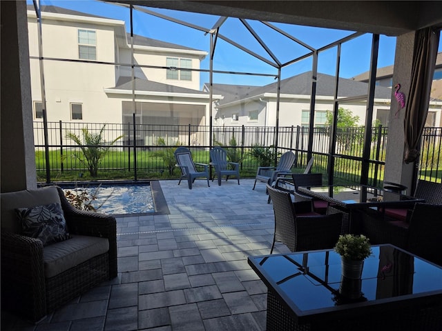 2853 Willowseed Ln, Saint Cloud, FL 34772 - fenced backyard with a patio area and glass enclosure