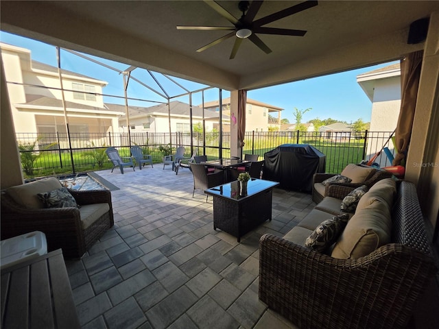 2853 Willowseed Ln, Saint Cloud, FL 34772 - view of patio featuring an outdoor living space, a grill, ceiling fan, and glass enclosure