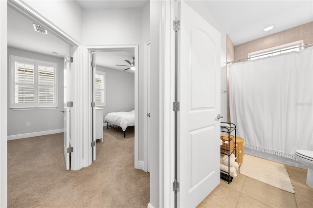 3204 Oxbow Ct, Saint Cloud, FL 34773 - full bathroom with a shower with shower curtain, ceiling fan, and connected bathroom