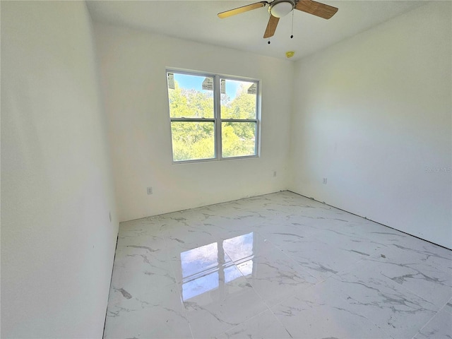 1236 N Virginia Ave, Lakeland, FL 33805 - spare room featuring a ceiling fan and light marble finish flooring