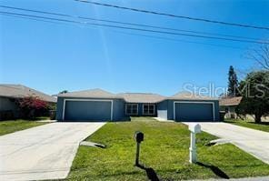 851 Adour Dr Unit A-B, Kissimmee, FL 34759 - ranch-style home with a garage, driveway, and a front yard