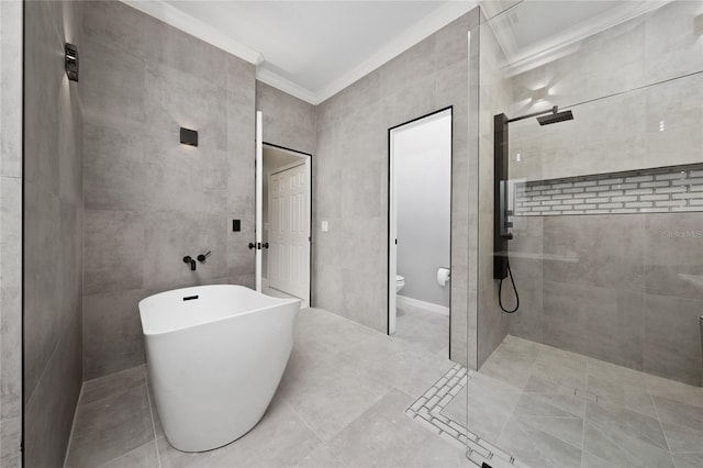 1950 Windward Oaks Ct, Kissimmee, FL 34746 - full bathroom featuring crown molding, tiled shower, and a freestanding tub