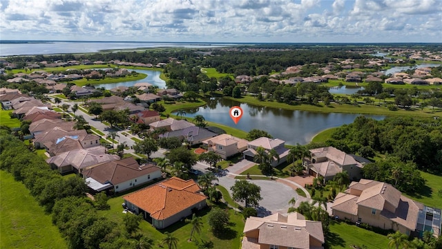 1950 Windward Oaks Ct, Kissimmee, FL 34746 - aerial perspective of suburban area featuring a large body of water