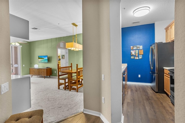 1351 Venezia Ct Unit 201, Davenport, FL 33896 - corridor featuring dark wood-style flooring and a textured wall