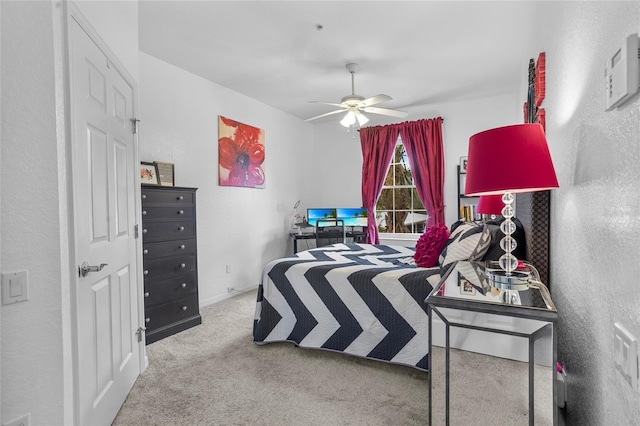 1351 Venezia Ct Unit 201, Davenport, FL 33896 - carpeted bedroom featuring a ceiling fan and a textured wall