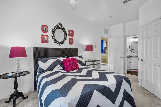 1351 Venezia Ct Unit 201, Davenport, FL 33896 - bedroom with light colored carpet, arched walkways, and ceiling fan