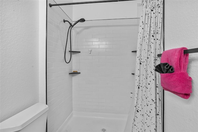 1351 Venezia Ct Unit 201, Davenport, FL 33896 - full bath featuring a stall shower and a textured wall
