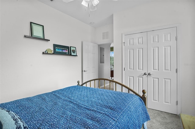 1351 Venezia Ct Unit 201, Davenport, FL 33896 - bedroom featuring light carpet, a closet, ceiling fan, and electric panel