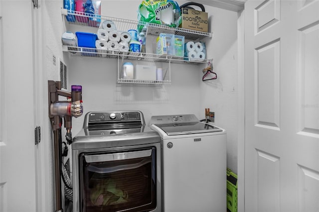 1351 Venezia Ct Unit 201, Davenport, FL 33896 - washroom featuring independent washer and dryer