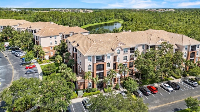 1351 Venezia Ct Unit 201, Davenport, FL 33896 - drone / aerial view of a heavily wooded area and a large body of water