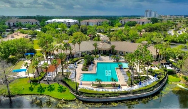 1351 Venezia Ct Unit 201, Davenport, FL 33896 - drone / aerial view of a pool and a nearby body of water