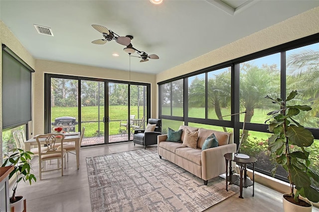 17109 Kenton Ter, Bradenton, FL 34202 - sunroom featuring finished concrete flooring, an outdoor living space, a ceiling fan, and recessed lighting