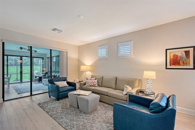 17109 Kenton Ter, Bradenton, FL 34202 - living area featuring light wood-style flooring and ceiling fan