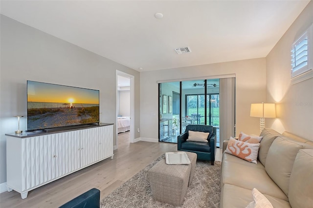 17109 Kenton Ter, Bradenton, FL 34202 - living area featuring light wood-type flooring and baseboards