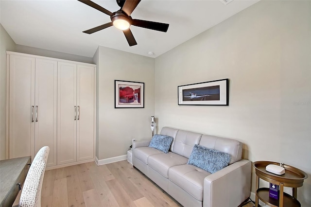 17109 Kenton Ter, Bradenton, FL 34202 - living area featuring ceiling fan and light wood finished floors