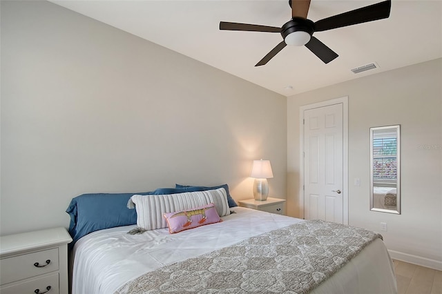 17109 Kenton Ter, Bradenton, FL 34202 - bedroom with ceiling fan and light wood-type flooring
