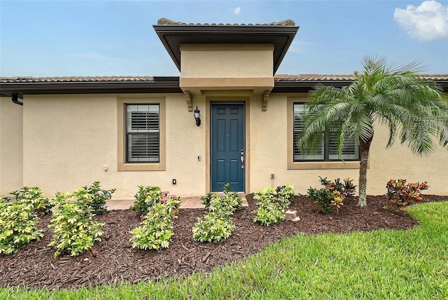 17109 Kenton Ter, Bradenton, FL 34202 - view of exterior entry with stucco siding