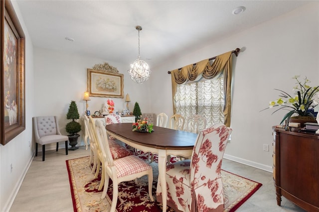 1452 Mickelson Ct, Davenport, FL 33896 - dining room with a chandelier and baseboards