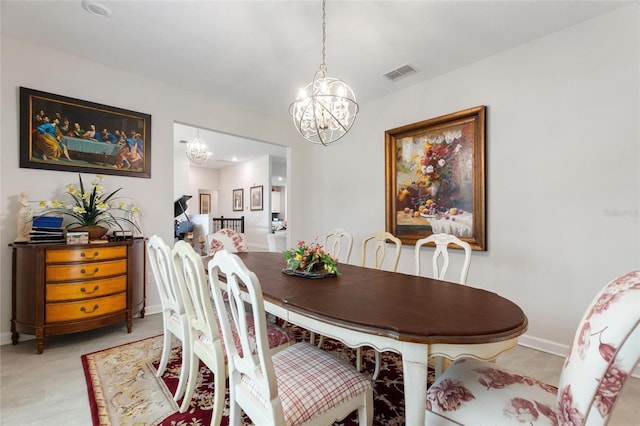 1452 Mickelson Ct, Davenport, FL 33896 - dining space featuring a chandelier and baseboards
