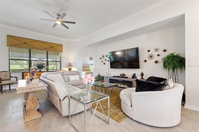 1452 Mickelson Ct, Davenport, FL 33896 - living area with crown molding, a ceiling fan, and a glass covered fireplace