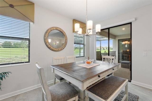 1452 Mickelson Ct, Davenport, FL 33896 - dining room with a chandelier and baseboards