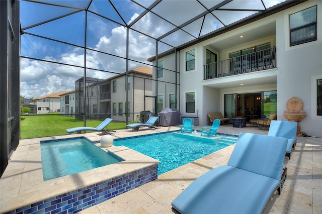 1452 Mickelson Ct, Davenport, FL 33896 - outdoor pool featuring a patio, an in-ground hot tub, a yard, glass enclosure, and grilling area