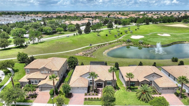 1452 Mickelson Ct, Davenport, FL 33896 - aerial view of residential area featuring a large body of water and a local golf course
