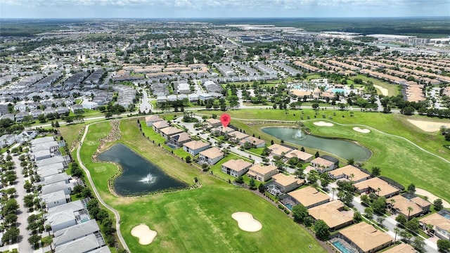 1452 Mickelson Ct, Davenport, FL 33896 - aerial view of property and surrounding area featuring a large body of water and nearby suburban area