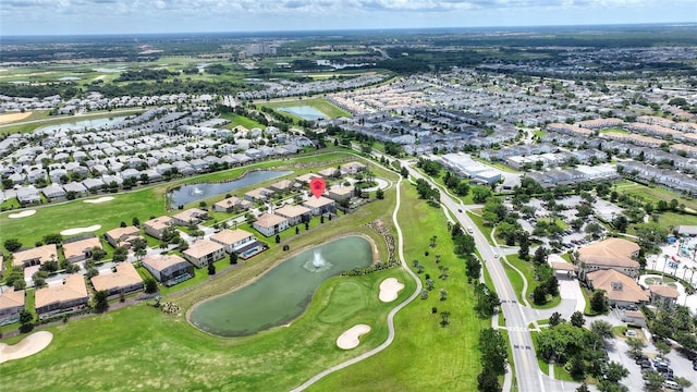 1452 Mickelson Ct, Davenport, FL 33896 - aerial overview of property's location featuring a nearby body of water, nearby suburban area, and a local golf course