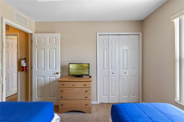 2708 Camaro Dr, Kissimmee, FL 34746 - bedroom with light colored carpet and a closet