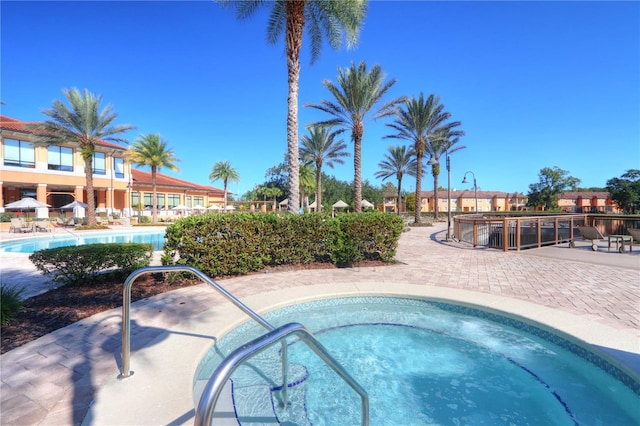 2708 Camaro Dr, Kissimmee, FL 34746 - community pool featuring a hot tub
