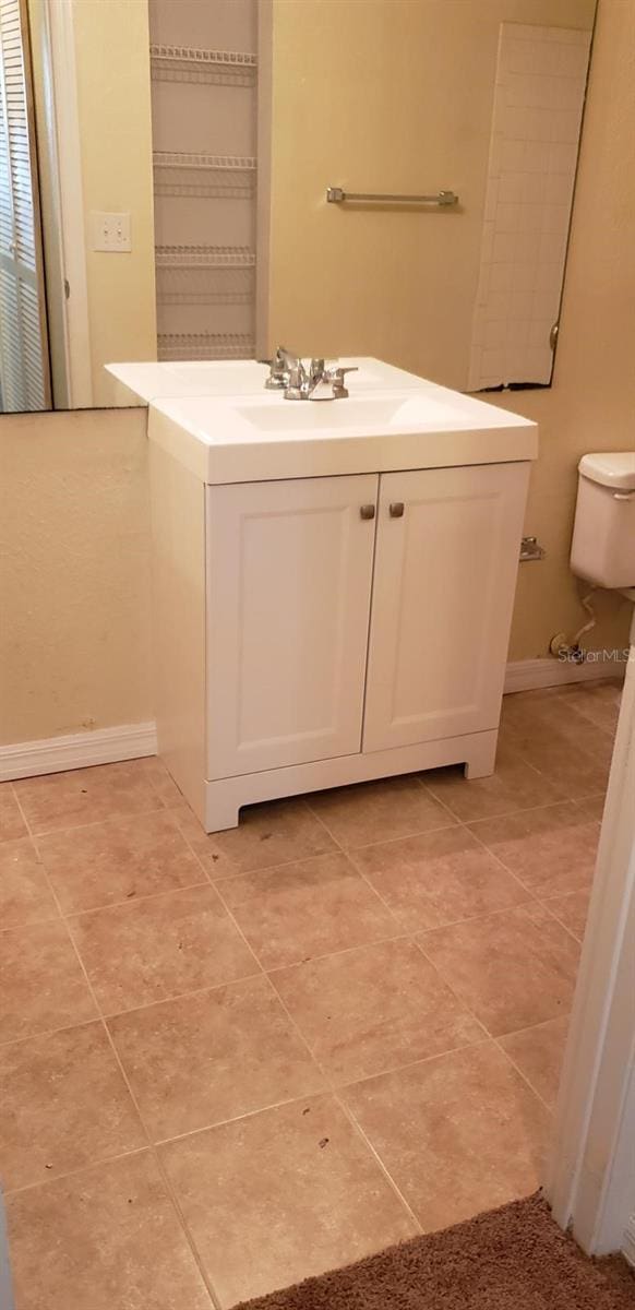 4540 Commander Dr Unit 2214, Orlando, FL 32822 - bathroom with vanity and tile patterned floors