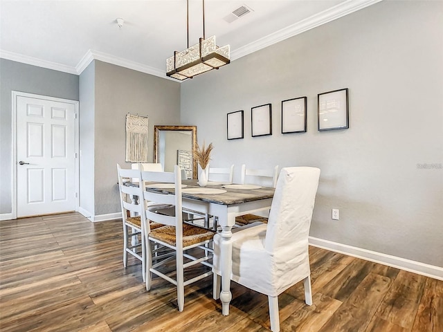 1361 Tuscan Ter Unit 7303, Davenport, FL 33896 - dining area with ornamental molding and wood finished floors