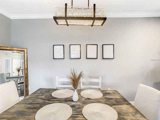 1361 Tuscan Ter Unit 7303, Davenport, FL 33896 - dining space featuring crown molding
