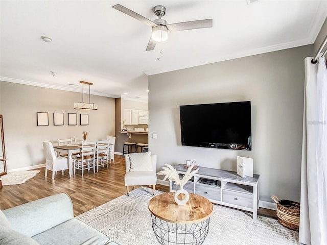 1361 Tuscan Ter Unit 7303, Davenport, FL 33896 - living room with ceiling fan, ornamental molding, and wood finished floors