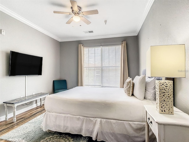 1361 Tuscan Ter Unit 7303, Davenport, FL 33896 - bedroom with ornamental molding, wood finished floors, and a ceiling fan