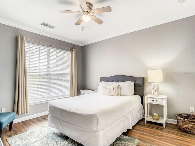 1361 Tuscan Ter Unit 7303, Davenport, FL 33896 - bedroom with wood finished floors, ornamental molding, and a ceiling fan