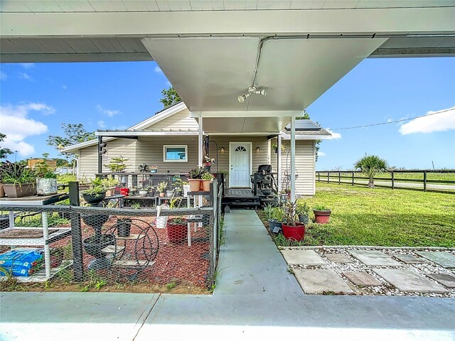 property entrance featuring covered porch