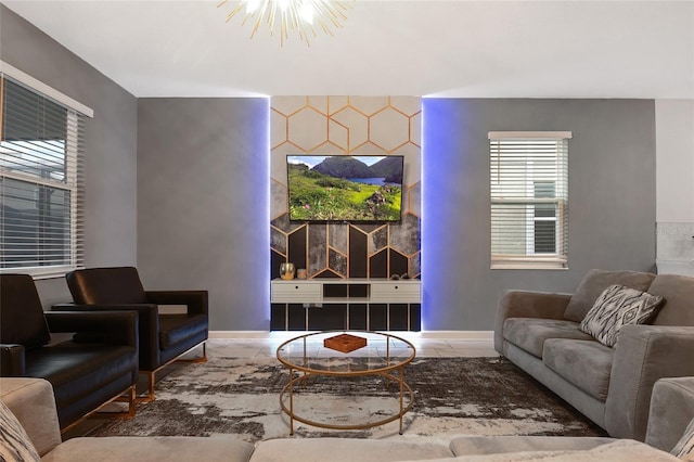 4547 Narrative Ln, Kissimmee, FL 34746 - living room featuring baseboards