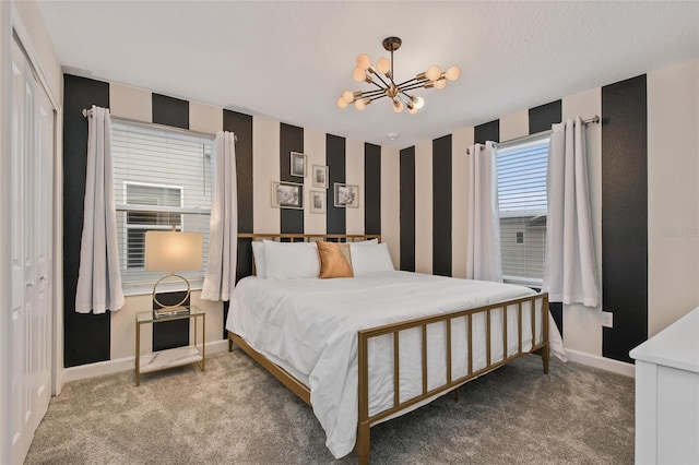 4547 Narrative Ln, Kissimmee, FL 34746 - bedroom featuring carpet flooring and a chandelier