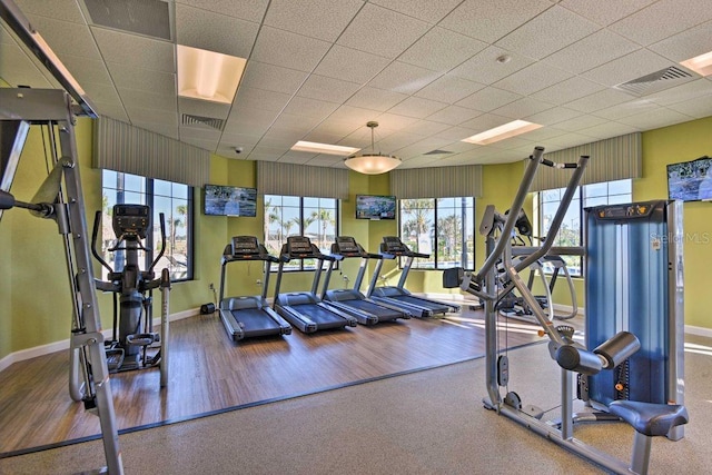 4547 Narrative Ln, Kissimmee, FL 34746 - exercise room featuring wood finished floors and a drop ceiling