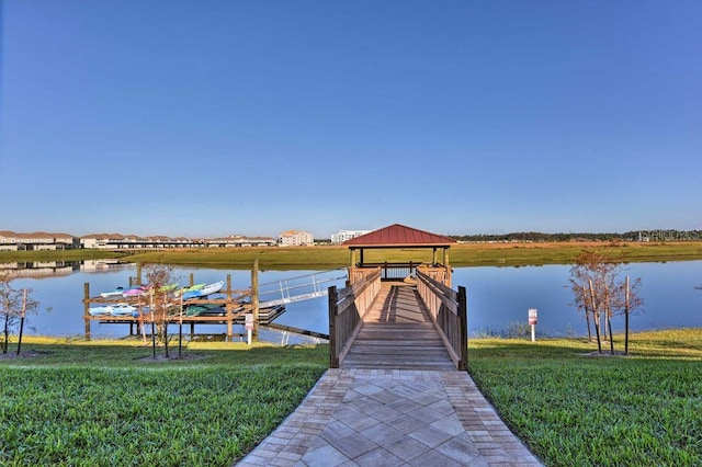 4547 Narrative Ln, Kissimmee, FL 34746 - dock with a gazebo, a water view, and a yard